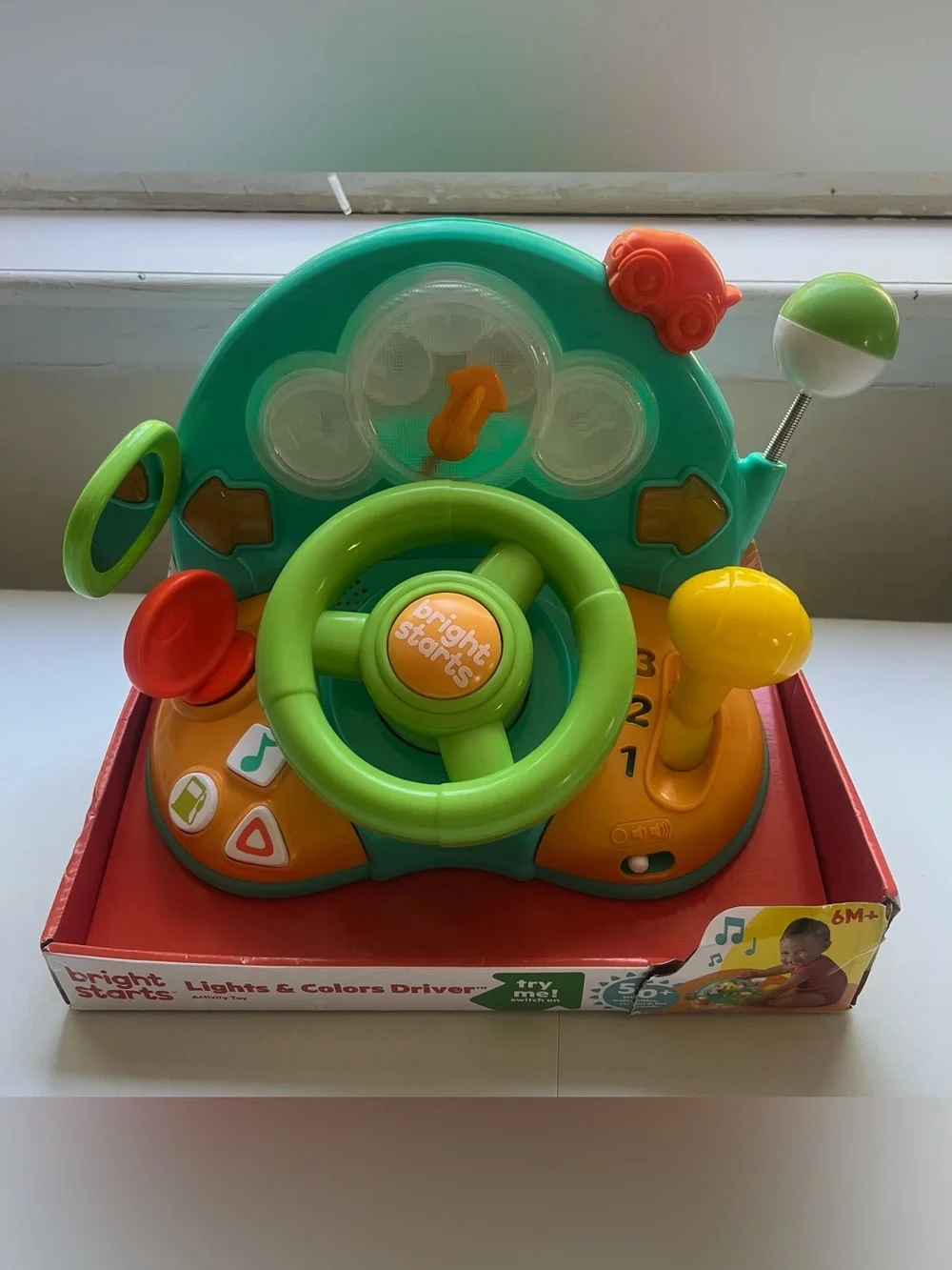 Bright Starts Lights & Colors Driver Steering Wheel Baby Toy: Educational Focus.